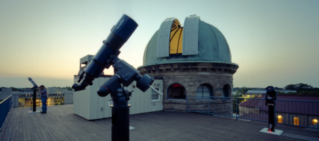 Photo: Rooftop telescopes and the vintage dome of Oberlin.